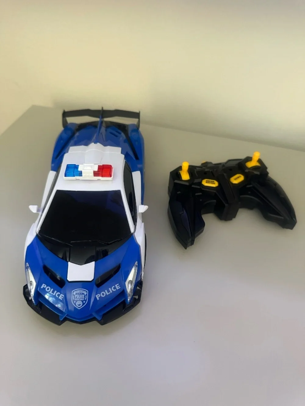 Remote control transforming police car